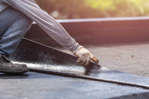 Professional Exterior Waterproofing technician working in Coleman, MI